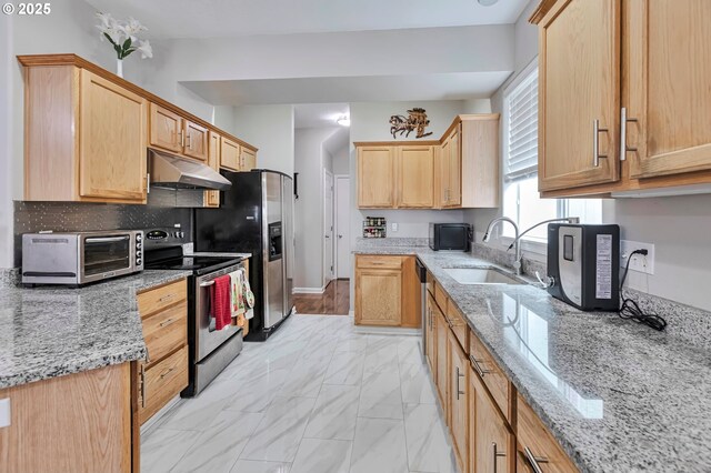 3963 NW 148th Pl, Portland, OR 97229 - kitchen featuring stainless steel appliances, under cabinet range hood, a sink, and light brown cabinets