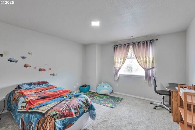 3963 NW 148th Pl, Portland, OR 97229 - bedroom featuring carpet flooring, baseboards, and a textured ceiling