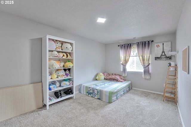 3963 NW 148th Pl, Portland, OR 97229 - carpeted bedroom featuring a textured ceiling