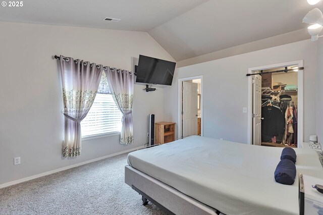 3963 NW 148th Pl, Portland, OR 97229 - bedroom featuring lofted ceiling, carpet, baseboards, and a spacious closet