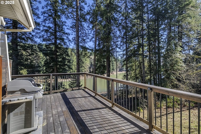 wooden deck with grilling area