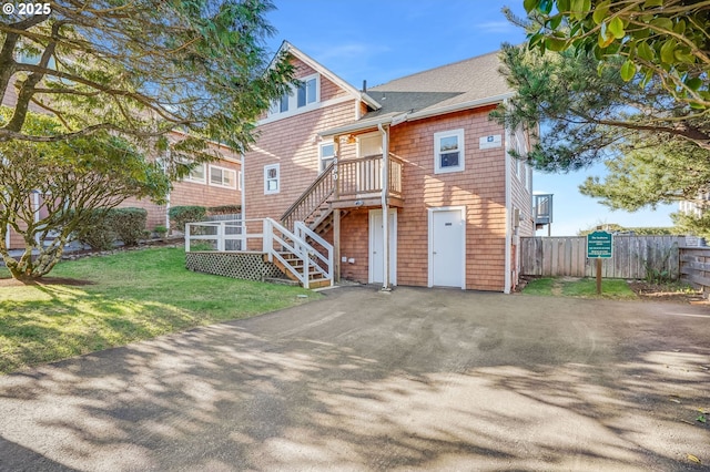 exterior space with a front lawn