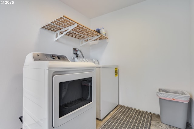 laundry room with washer and dryer