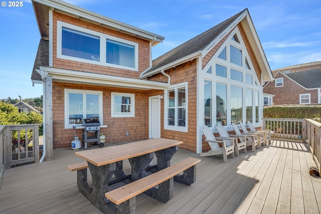 wooden terrace with grilling area