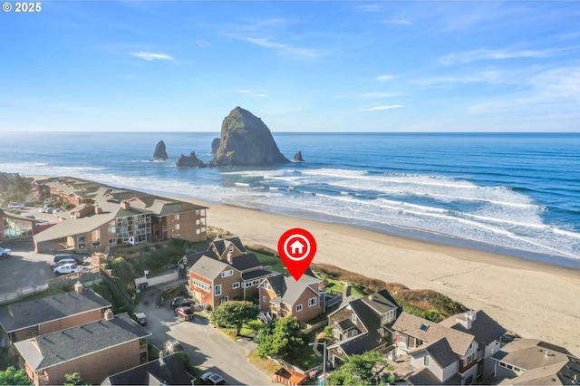 exterior space with a view of the beach and a water view