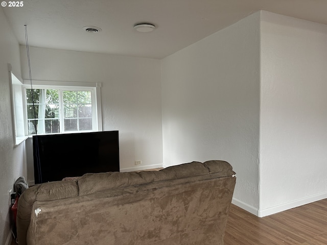 living room with dark wood-type flooring