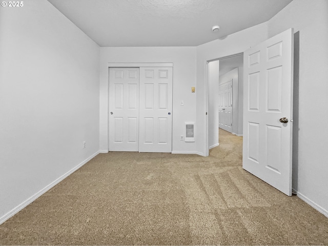 1806 NE 89th Cir, Vancouver, WA 98665 - unfurnished bedroom with baseboards, a closet, heating unit, and light colored carpet