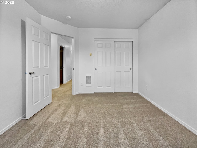 1806 NE 89th Cir, Vancouver, WA 98665 - unfurnished bedroom with carpet, heating unit, a closet, a textured ceiling, and baseboards