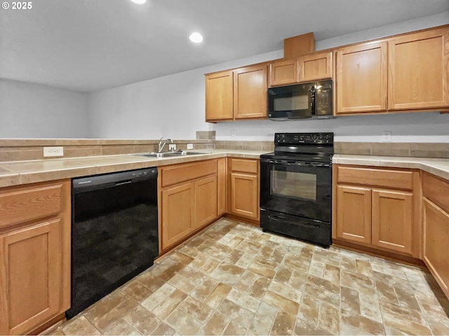 1806 NE 89th Cir, Vancouver, WA 98665 - kitchen featuring tile counters, recessed lighting, a sink, and black appliances
