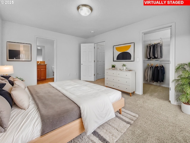 1806 NE 89th Cir, Vancouver, WA 98665 - bedroom with light carpet, ensuite bath, a closet, and a walk in closet
