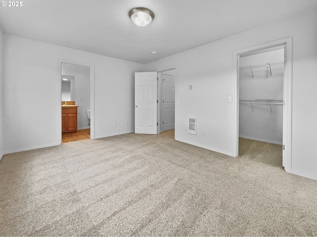 1806 NE 89th Cir, Vancouver, WA 98665 - unfurnished bedroom featuring a closet, carpet, a walk in closet, and baseboards