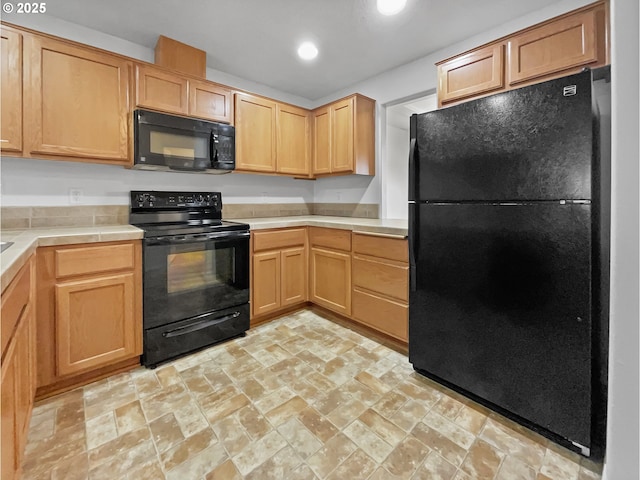1806 NE 89th Cir, Vancouver, WA 98665 - kitchen with black appliances, recessed lighting, tile counters, and light brown cabinetry