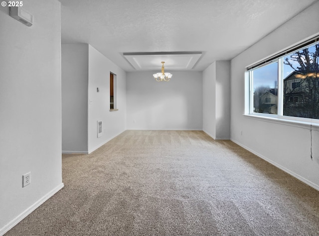 1806 NE 89th Cir, Vancouver, WA 98665 - empty room featuring baseboards, carpet floors, a textured ceiling, and a notable chandelier