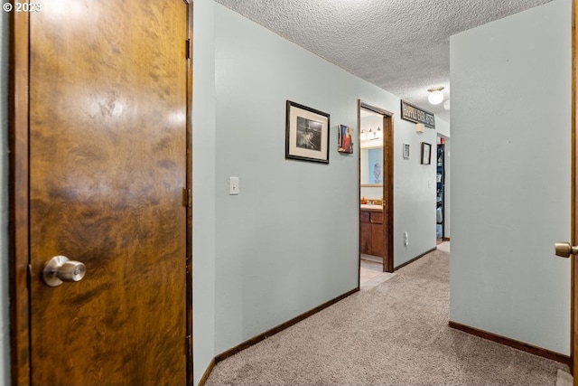 835 E 4th St, La Center, WA 98629 - hallway with a textured ceiling and light carpet