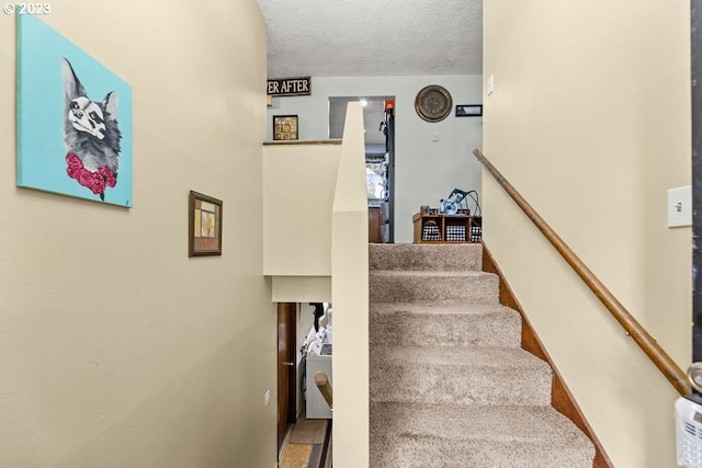 835 E 4th St, La Center, WA 98629 - stairs with a textured ceiling