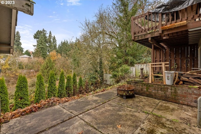 835 E 4th St, La Center, WA 98629 - view of patio / terrace with a fire pit and a deck