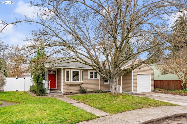 view of front of house featuring a gate, fence, a front lawn, and concrete driveway