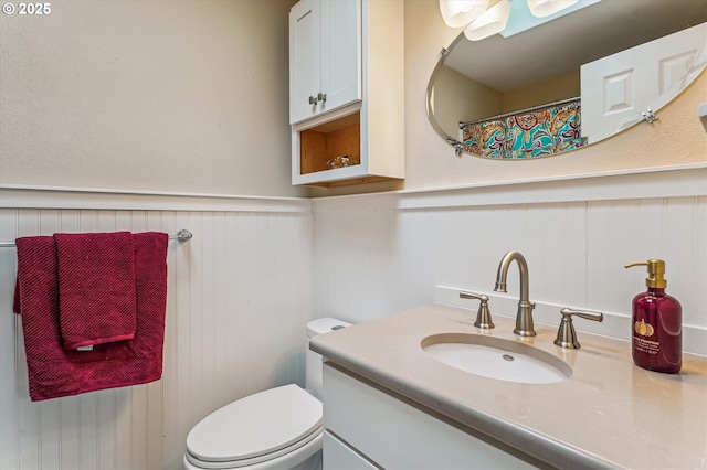 1722 Sequoia Ct, Forest Grove, OR 97116 - bathroom featuring vanity, wainscoting, a decorative wall, and curtained shower
