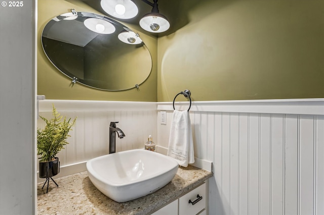 1722 Sequoia Ct, Forest Grove, OR 97116 - bathroom featuring vanity, a wainscoted wall, and a decorative wall