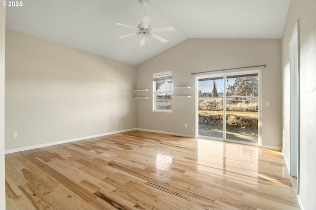 unfurnished room featuring vaulted ceiling, ceiling fan, and light wood-type flooring