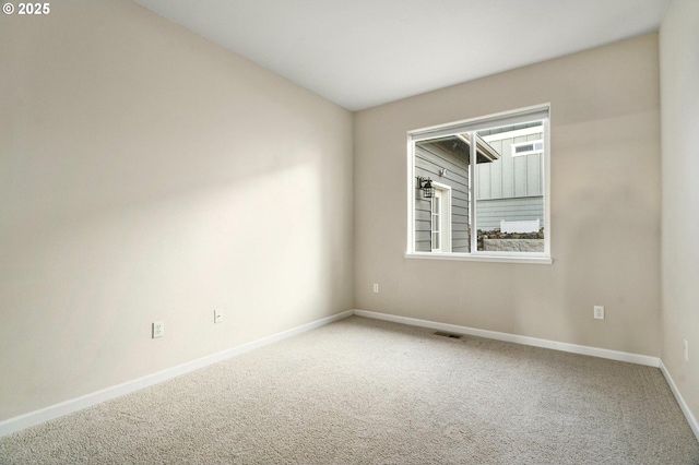 view of carpeted spare room