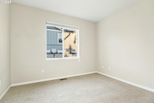 view of carpeted spare room