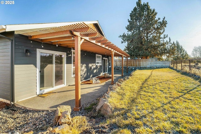 view of yard featuring a pergola and a patio