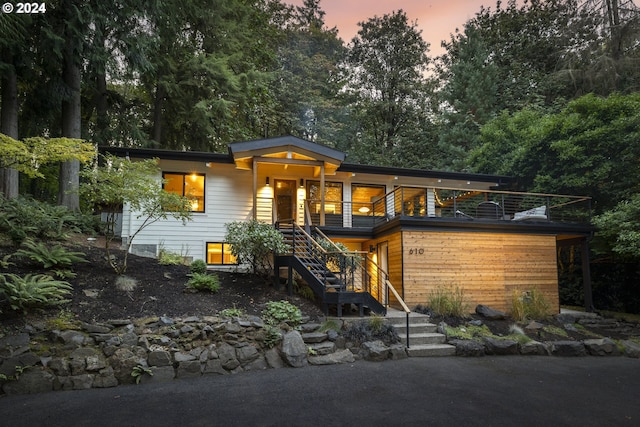 view of front of house with stairs