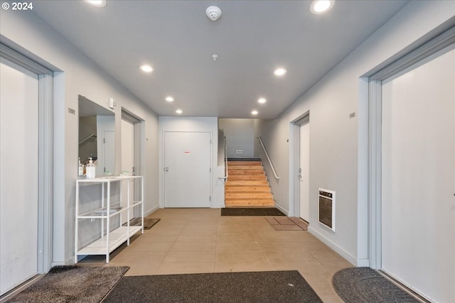 1480 N Jarrett St Unit 103, Portland, OR 97217 - corridor featuring recessed lighting, heating unit, baseboards, and stairway
