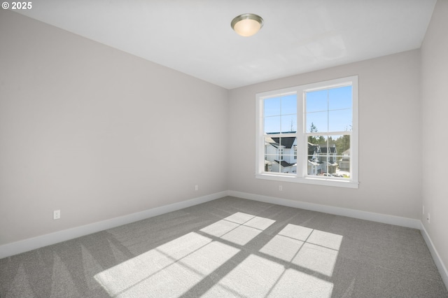 spare room featuring carpet flooring