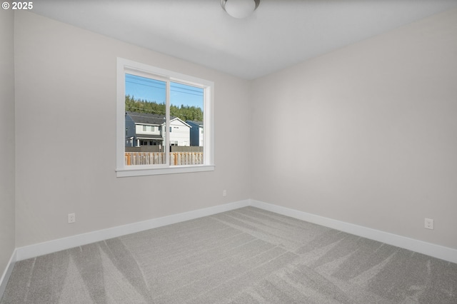 view of carpeted spare room