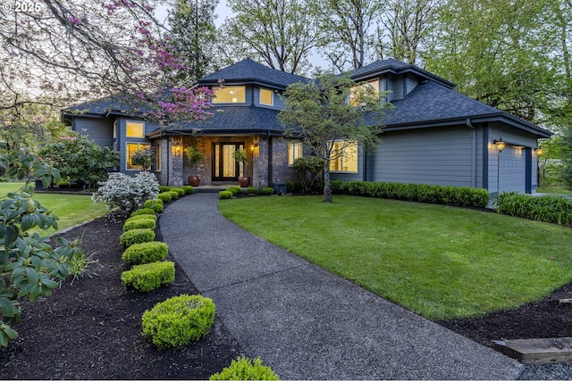 38201 Queens Rd, Marcola, OR 97454 - view of front facade with a shingled roof, an attached garage, and a front lawn
