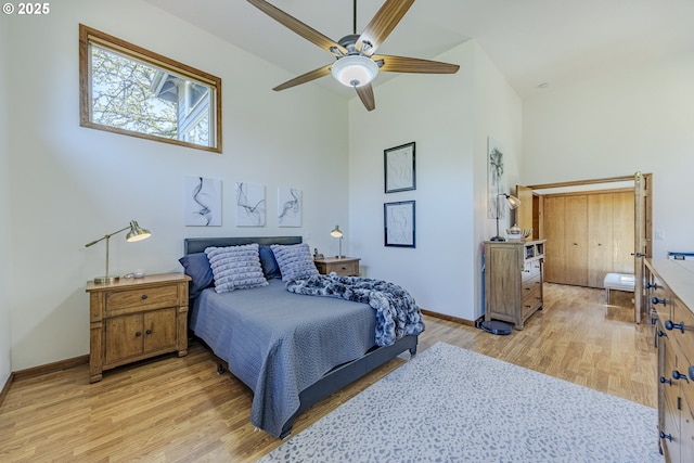 38201 Queens Rd, Marcola, OR 97454 - bedroom with baseboards, light wood finished floors, and a towering ceiling