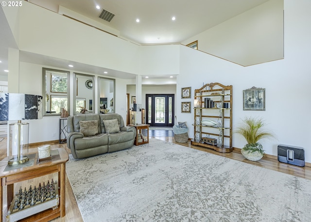 38201 Queens Rd, Marcola, OR 97454 - living area featuring recessed lighting, a high ceiling, visible vents, and wood finished floors