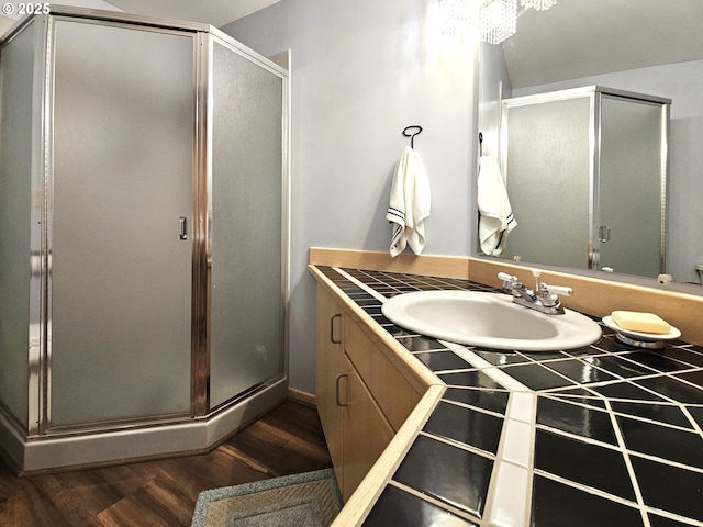 3300 NE 164th St Unit S-1, Ridgefield, WA 98642 - full bathroom with wood finished floors, a shower stall, and vanity