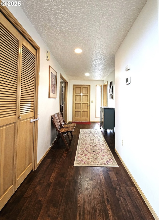 3300 NE 164th St Unit S-1, Ridgefield, WA 98642 - corridor with a textured ceiling, wood finished floors, baseboards, and recessed lighting