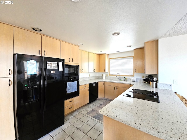 3300 NE 164th St Unit S-1, Ridgefield, WA 98642 - kitchen with black appliances, light brown cabinetry, light tile patterned flooring, a sink, and a textured ceiling