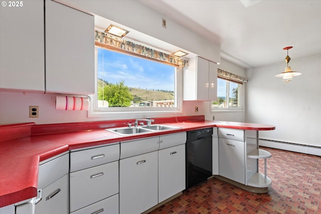 901 H Ave, La Grande, OR 97850 - kitchen featuring a sink, black dishwasher, baseboard heating, a peninsula, and white cabinets