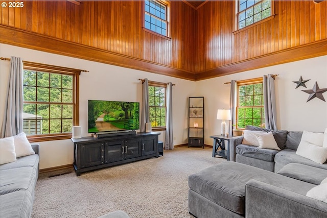 26127 NW Williams Canyon Rd, Gaston, OR 97119 - living room with light colored carpet, baseboards, and a high ceiling