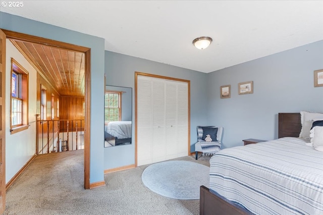 26127 NW Williams Canyon Rd, Gaston, OR 97119 - bedroom with carpet floors, a closet, and baseboards