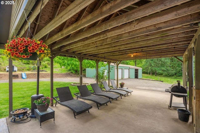26127 NW Williams Canyon Rd, Gaston, OR 97119 - view of patio / terrace with an outbuilding and a grill