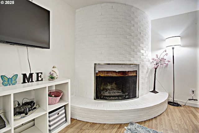21408 SE Main St, Gresham, OR 97030 - living area featuring a brick fireplace and wood finished floors
