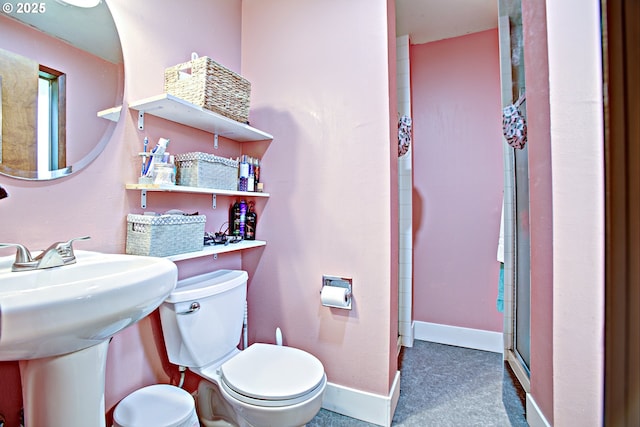 21408 SE Main St, Gresham, OR 97030 - bathroom with toilet, a shower, and baseboards
