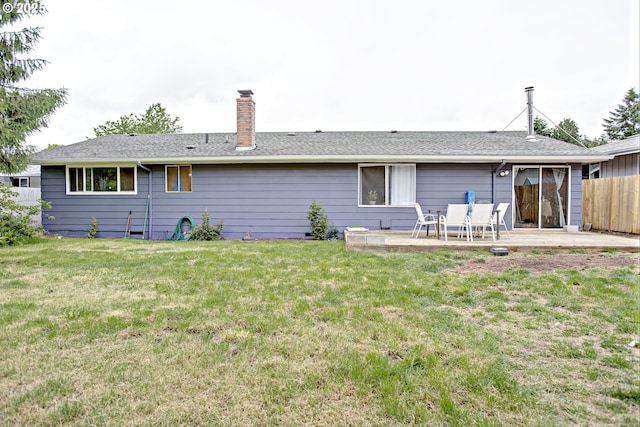 21408 SE Main St, Gresham, OR 97030 - rear view of property featuring a chimney and a patio area