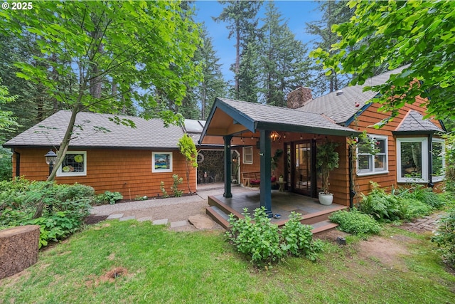 22060 S Forest Park Rd, Beavercreek, OR 97004 - back of property featuring a chimney, a patio area, and a yard