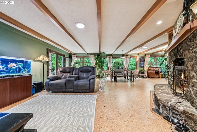 22060 S Forest Park Rd, Beavercreek, OR 97004 - living room featuring a stone fireplace, beam ceiling, recessed lighting, and a textured ceiling