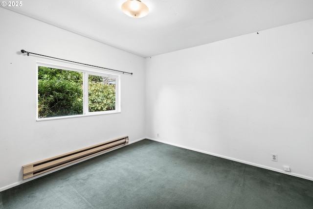 unfurnished room with a baseboard radiator and dark colored carpet