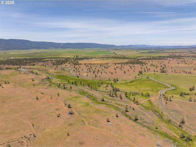 10771 E Langell Valley Rd, Bonanza, OR 97623 - aerial overview of property's location with mountains and rural landscape