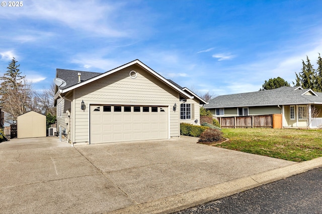 ranch-style home with a garage, a front yard, and concrete driveway