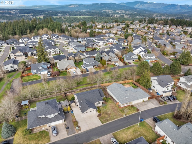 birds eye view of property with a residential view and a mountain view